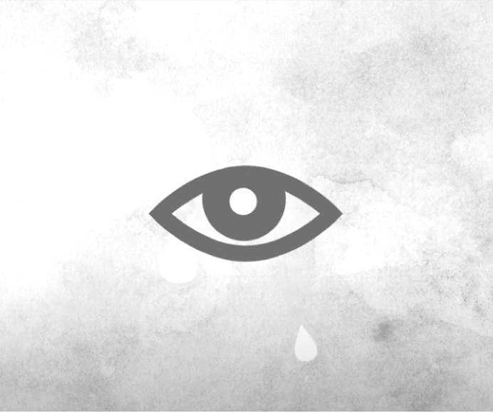 An illustrated eye with a single tear